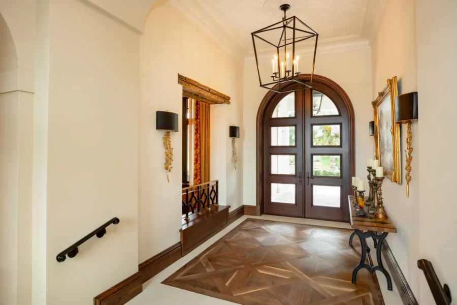 Entry Foyer with Stained In-lay Wood Flooring and Stone Border