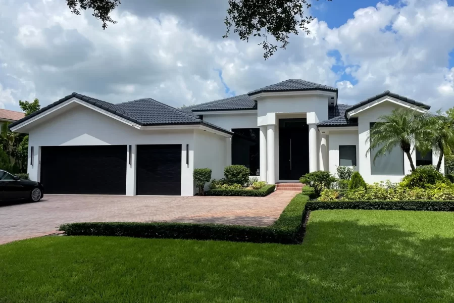 Front Modern updated with large format impact glass and large entry pivot door