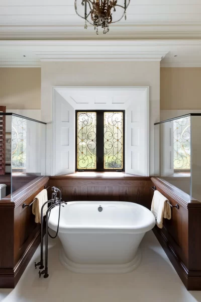 Master Tub with Stained Glass Window