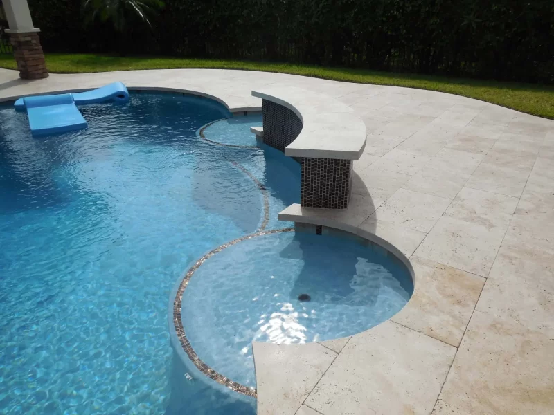 Pool Remodeling with new sheer descent, sun seats, bench, and pool finish