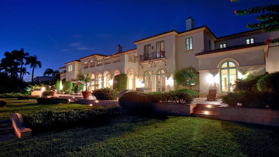 Bayside view at dusk of Rear decking, arched Bayside Terraced landscape